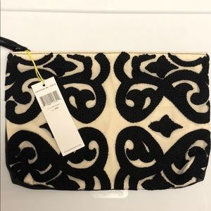 BCBG Generation Black and Natural clutch